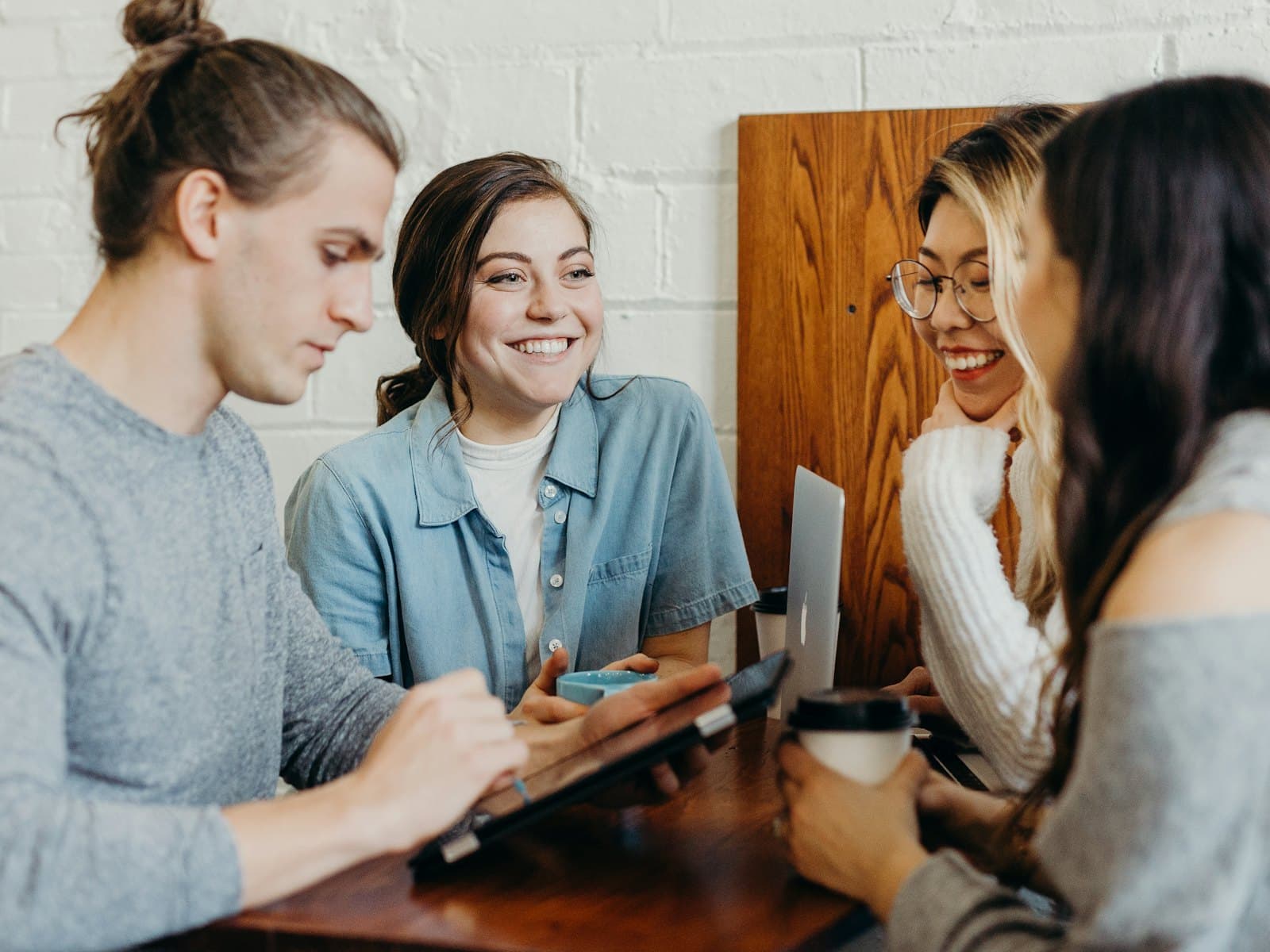 Colleagues talking together in a workplace